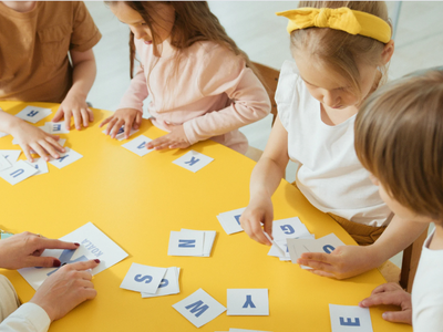 Childern playing with letters