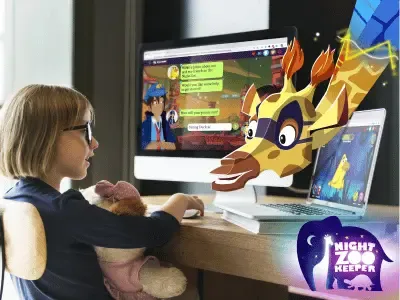 Girl on computer playing on Night Zookeeper with Sam the giraffe.