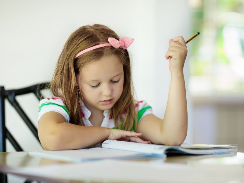 Child practicing their writing.