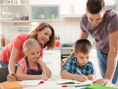 Family writing together.