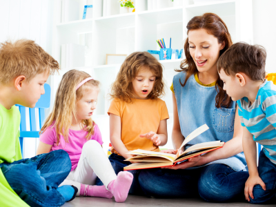 Teacher telling a story to their students.