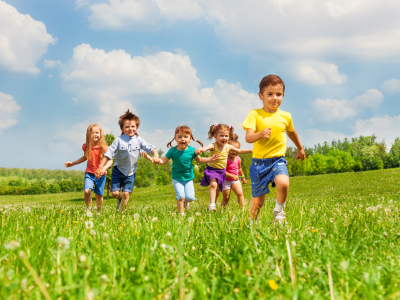 Children running in a field.