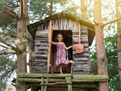 Girl in a treehouse.