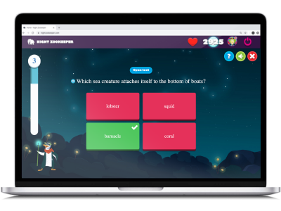 Curriculum challenge on Night Zookeeper, displayed on laptop screen.