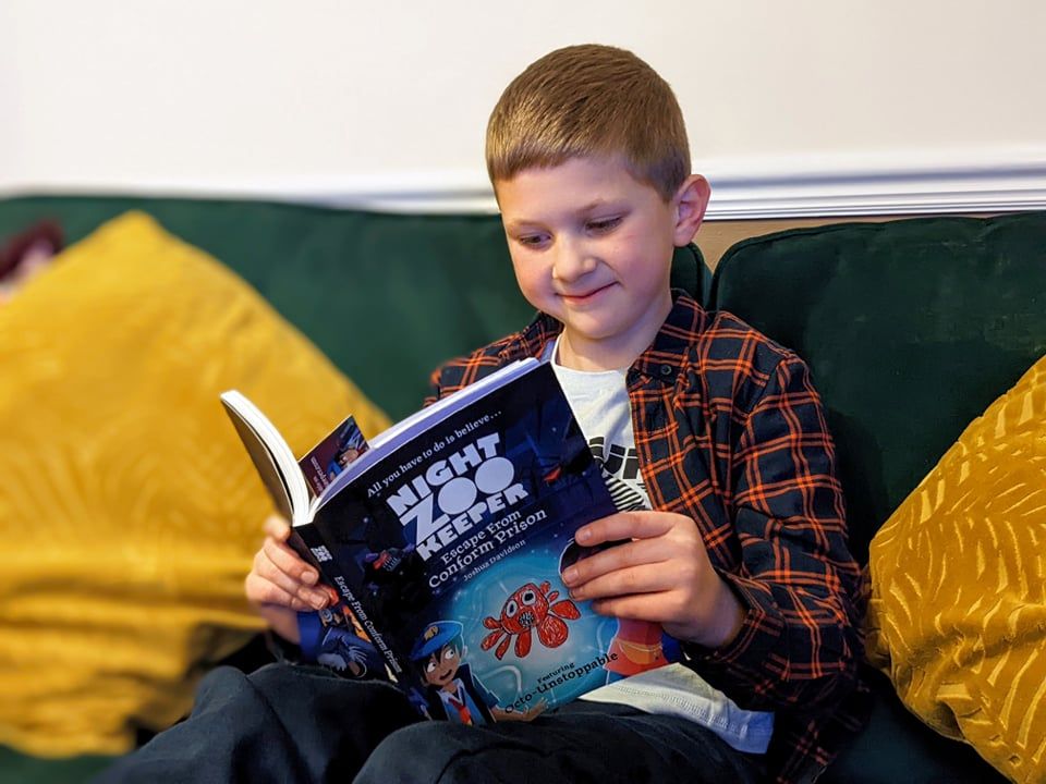 Child reading a book.