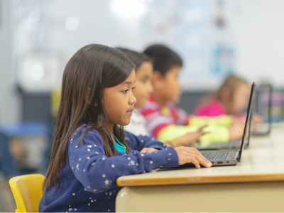 Children working on laptops