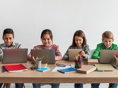 Kids working on laptops