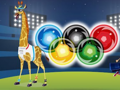 Sam the Giraffe next to the Olympic Rings